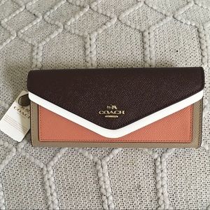 Brand new coach colorblock wallet!